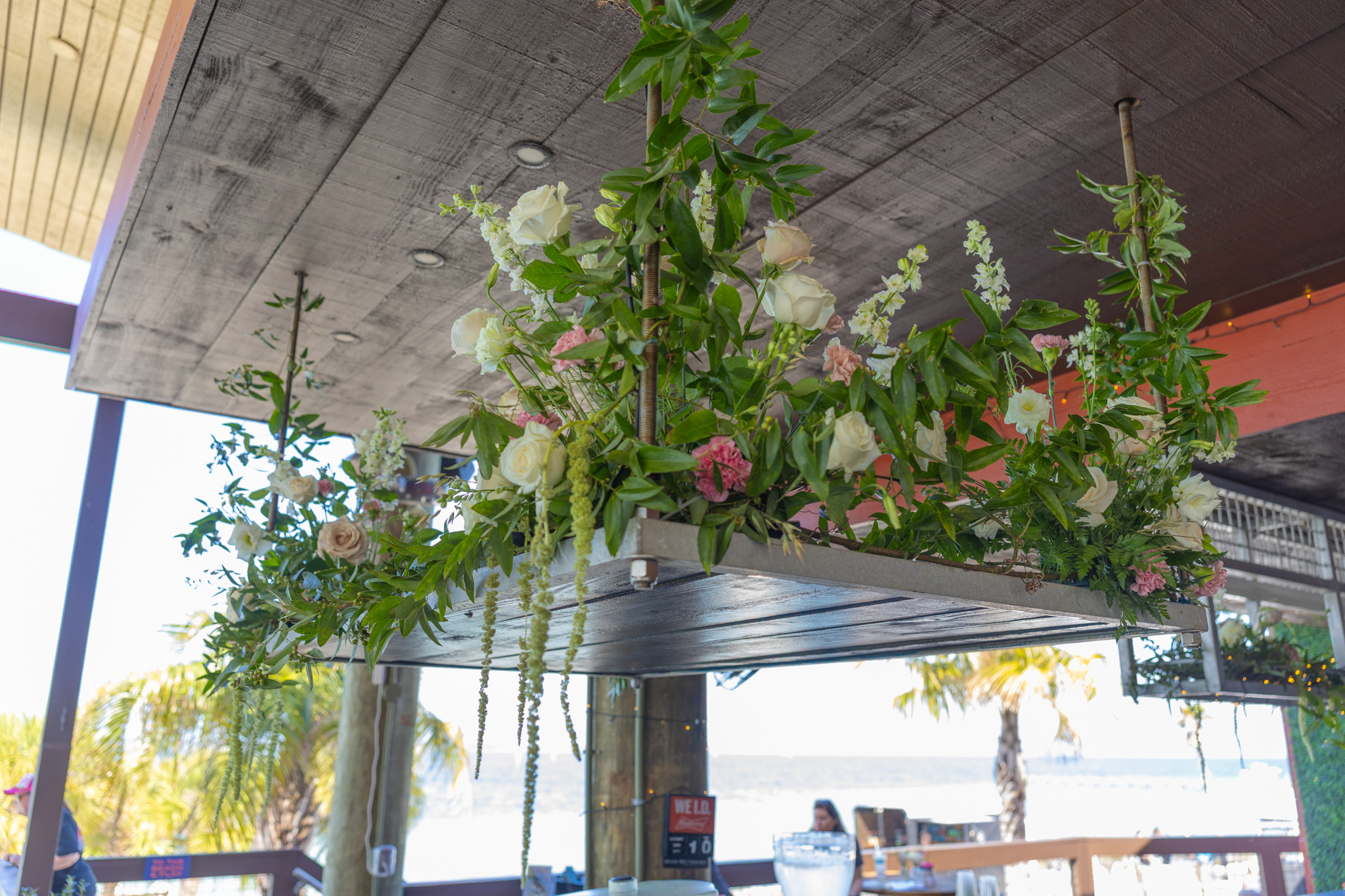 Picture of flowers and plants hanging in The Landing