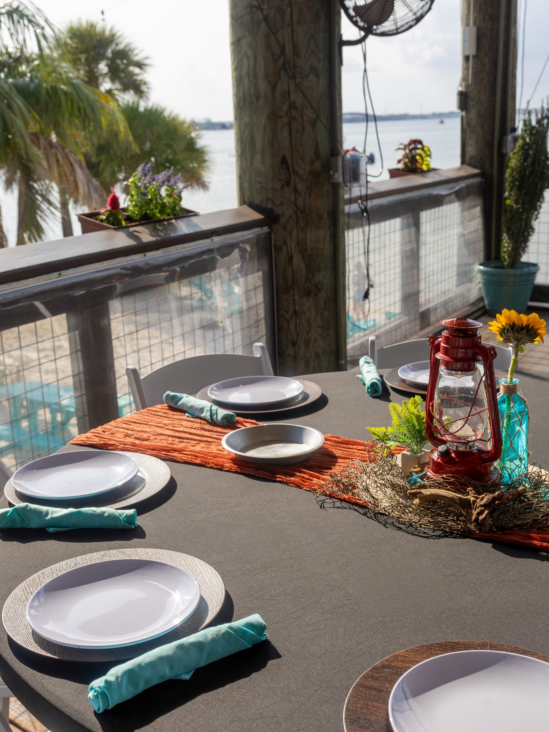 Outdoor dining setup by water
