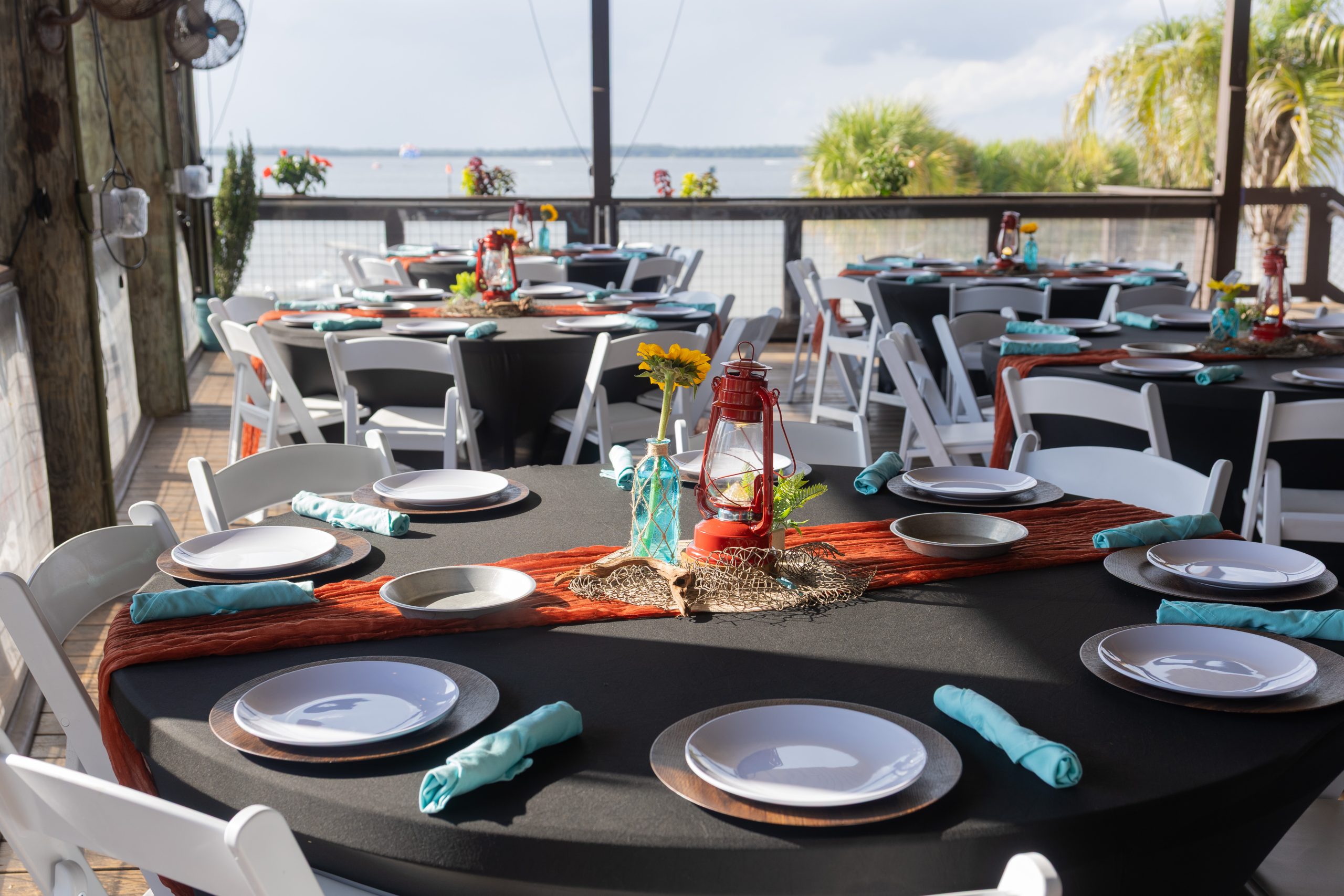 Decorated tables by the water
