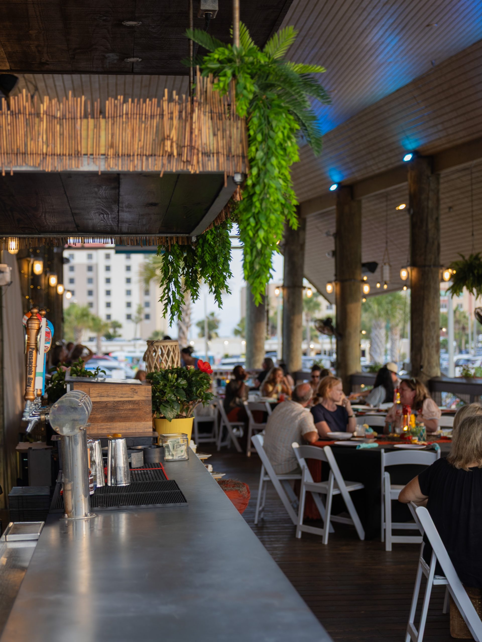 Outdoor dining area with greenery